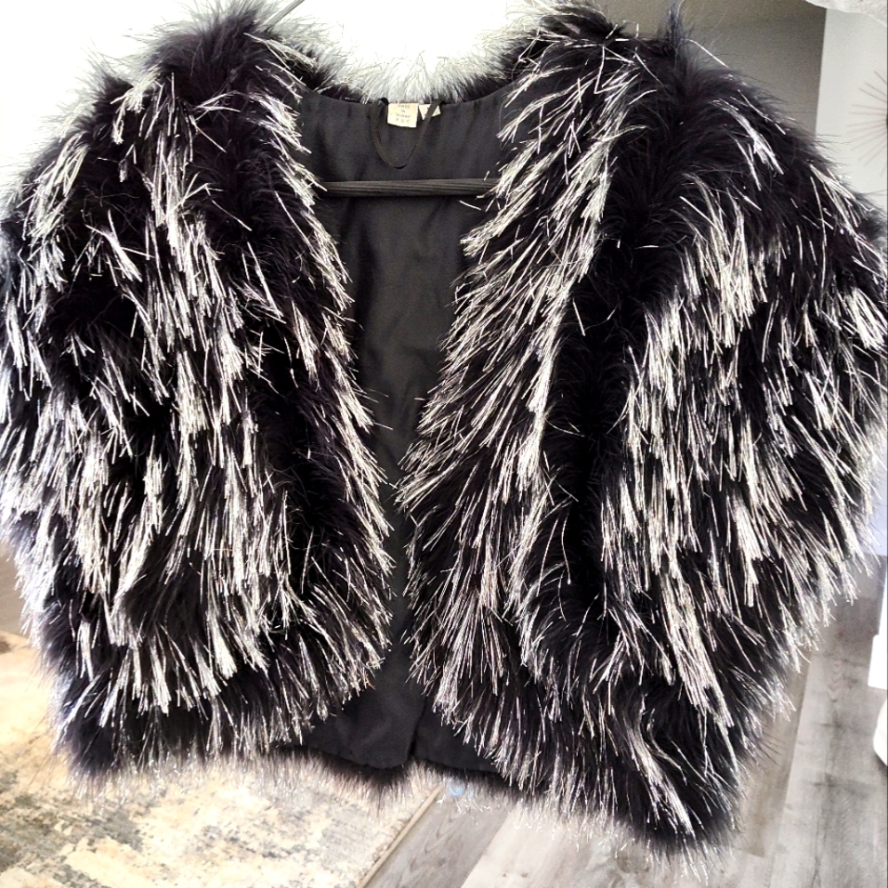 Beautiful Ostrich and metallic crop jacket.